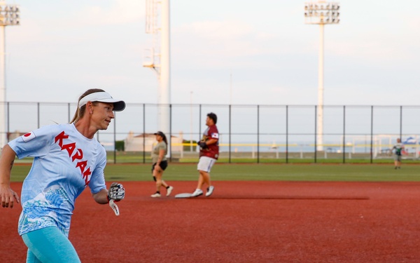 Abraham Lincoln Sailors participate in a MWR softball game