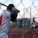 Abraham Lincoln Sailors participate in a MWR softball game