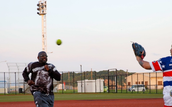 Abraham Lincoln Sailors participate in a MWR softball game
