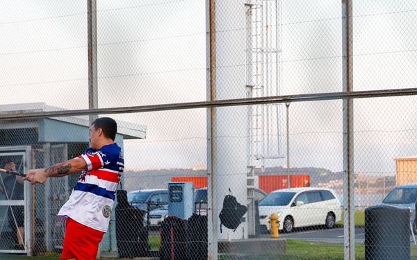 Abraham Lincoln Sailors participate in a MWR softball game