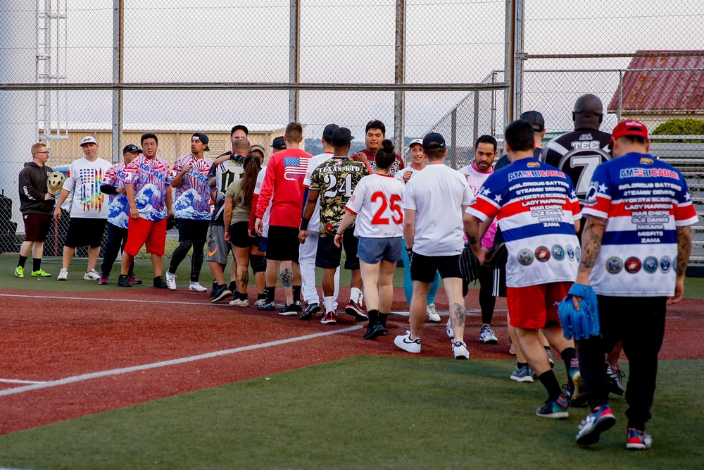 Abraham Lincoln Sailors participate in a MWR softball game
