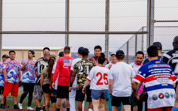 Abraham Lincoln Sailors participate in a MWR softball game