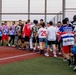 Abraham Lincoln Sailors participate in a MWR softball game