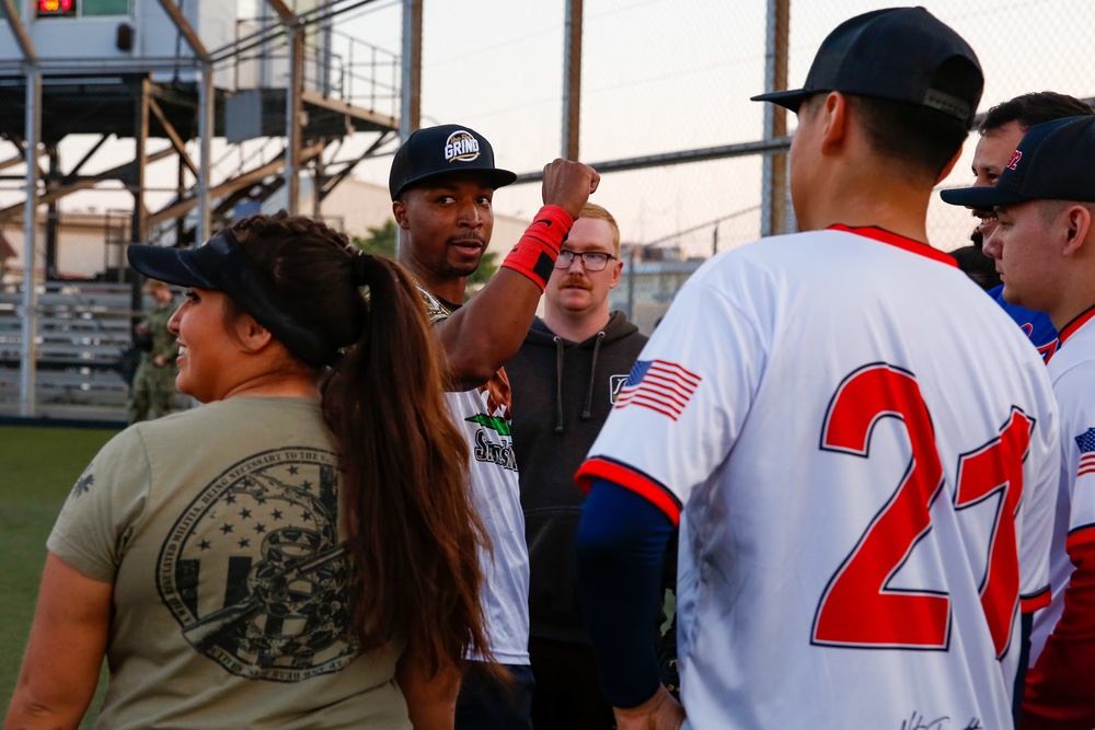 Abraham Lincoln Sailors participate in a MWR softball game