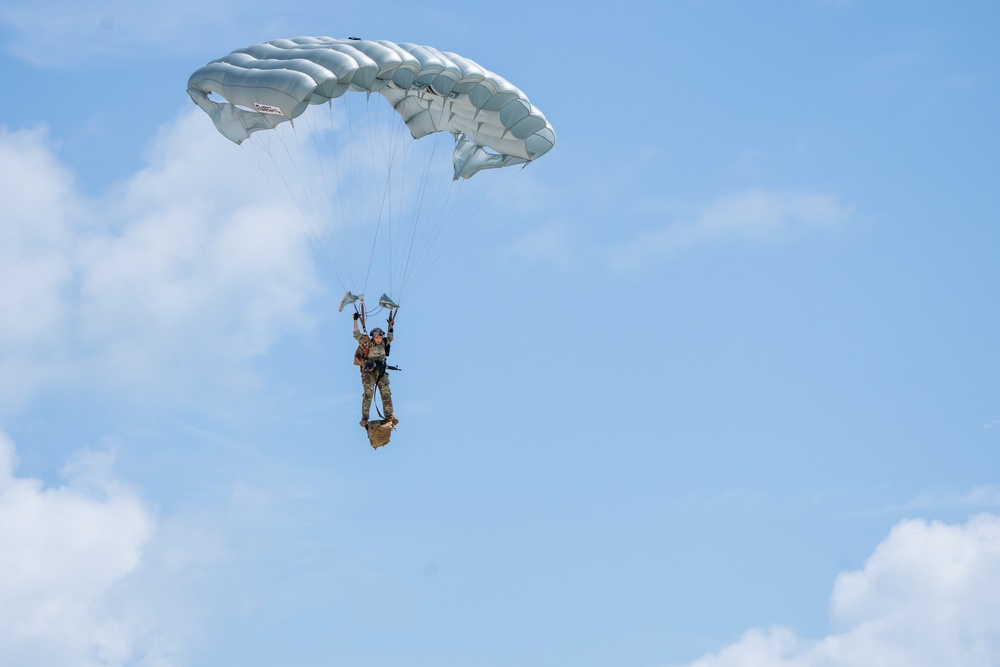The U.S. Army Special Operations Command parachute team jumps in Miami for Hyundai Air and Sea Show