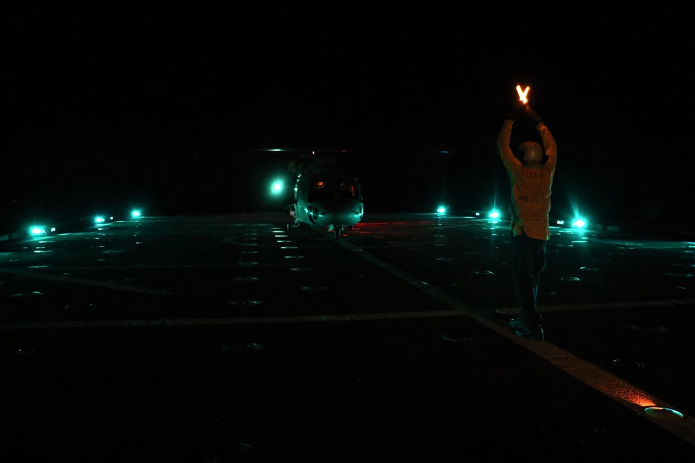 USS Jackson and RTN Sikorsky S-76B deck landing qualifications