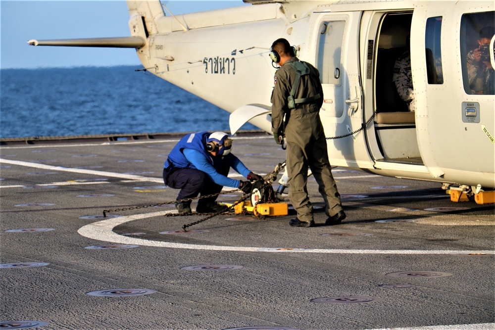 USS Jackson and RTN Sikorsky S-76B deck landing qualifications