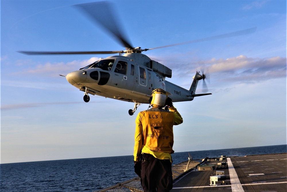 USS Jackson and RTN Sikorsky S-76B deck landing qualifications