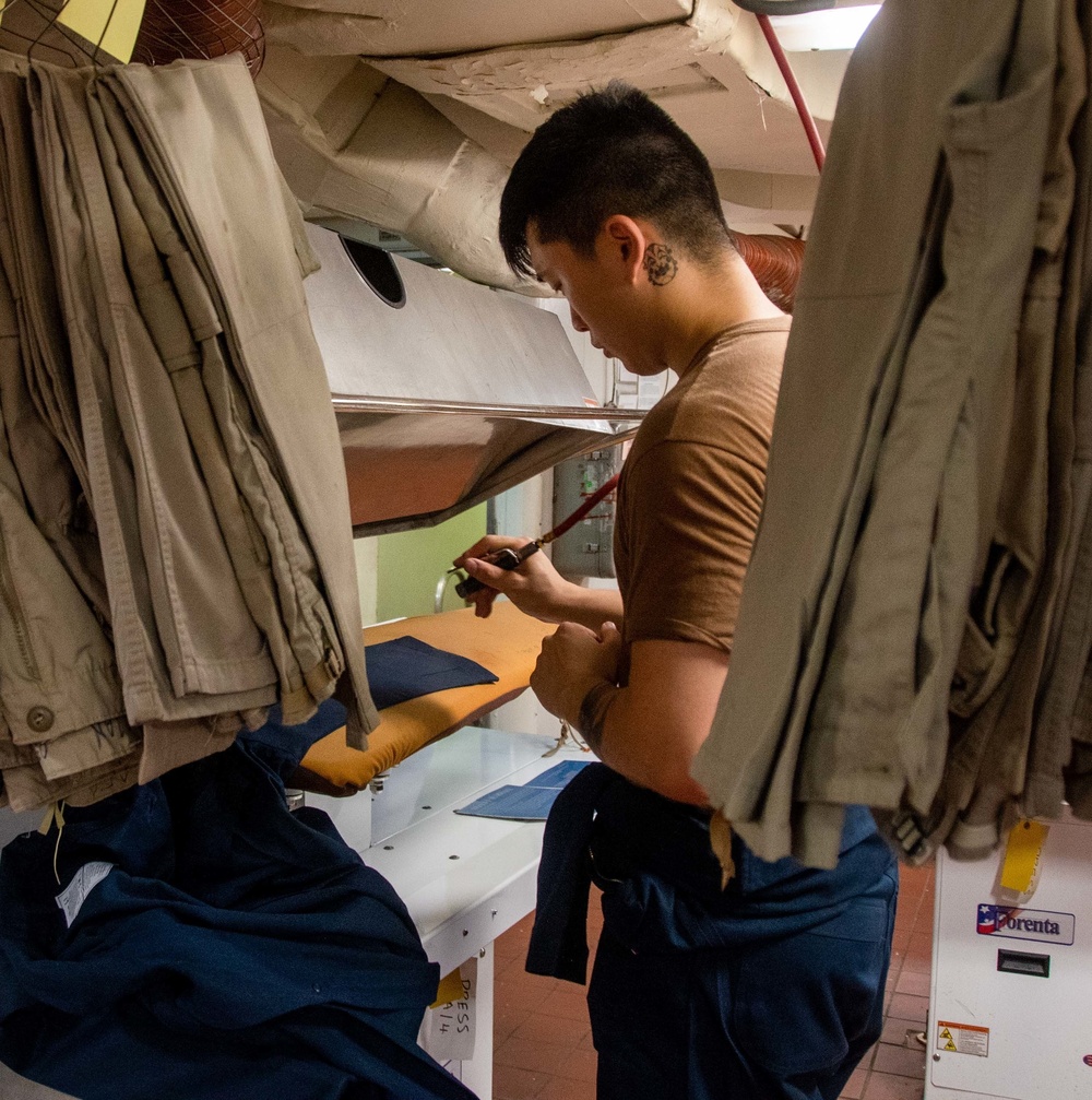 USS Ronald Reagan (CVN 76) Sailors perform routine maintenance