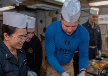USS Ronald Reagan (CVN-76) Sailors serve Sunday brunch