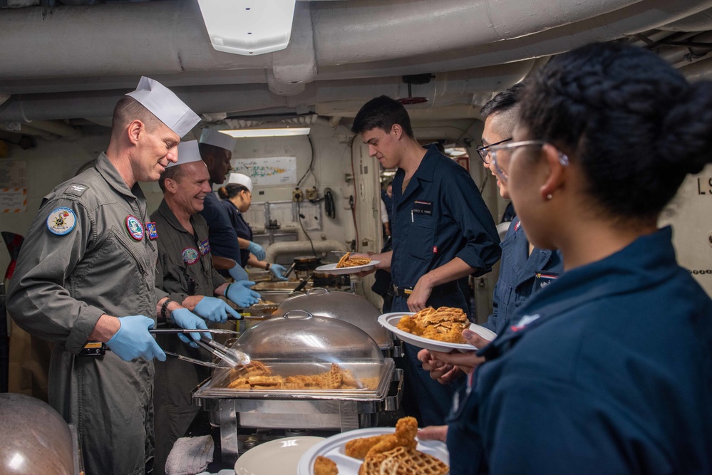 USS Ronald Reagan (CVN-76) Sailors serve Sunday brunch