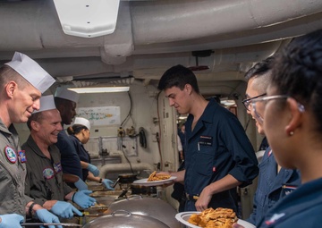 USS Ronald Reagan (CVN-76) Sailors serve Sunday brunch