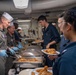 USS Ronald Reagan (CVN-76) Sailors serve Sunday brunch