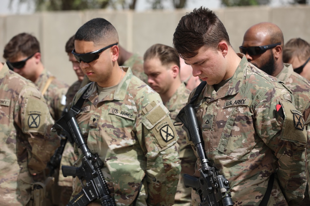 CJTF-OIR personnel conduct a Memorial Day observance at Union III Forward Operating Base, Iraq