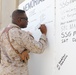 CJTF-OIR personnel conduct a Memorial Day observance at Union III Forward Operating Base, Iraq