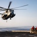 Helicopter support team training aboard USS Arlington