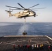 Helicopter support team training aboard USS Arlington