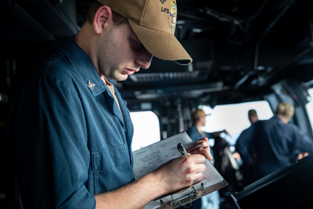 Ship’s Nautical Or Otherwise Photographic Intelligence and Exploitation team trains aboard USS Arlington