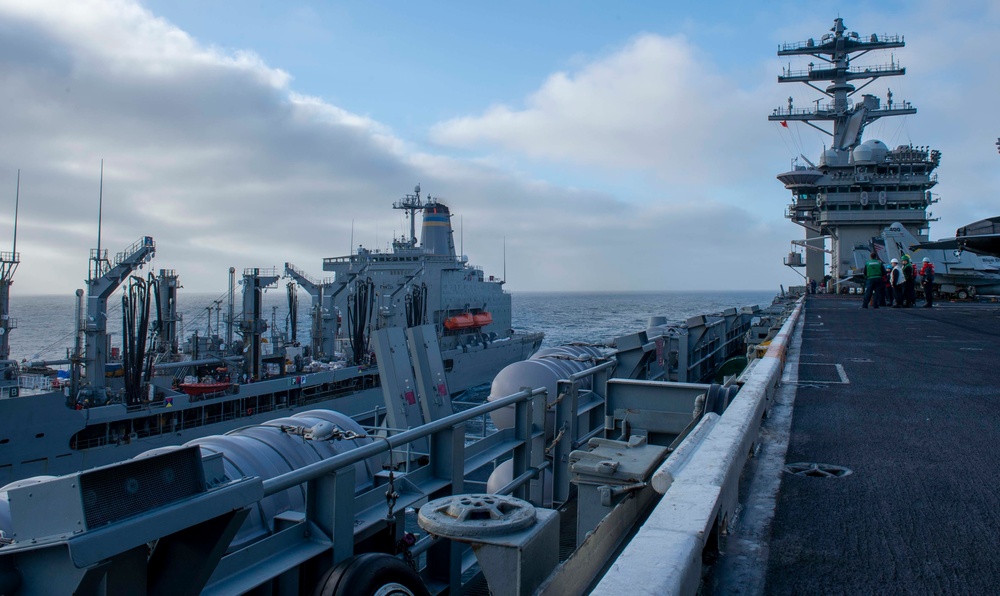 USNS Henry J. Kaiser sails with Nimitz