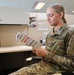 Dogface Soldier reads FVAP brochure