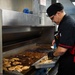 USS Carl Vinson (CVN 70) Sailor Prepares Dinner