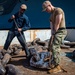 USS Carl Vinson (CVN 70) Sailors Move Anchor Chain