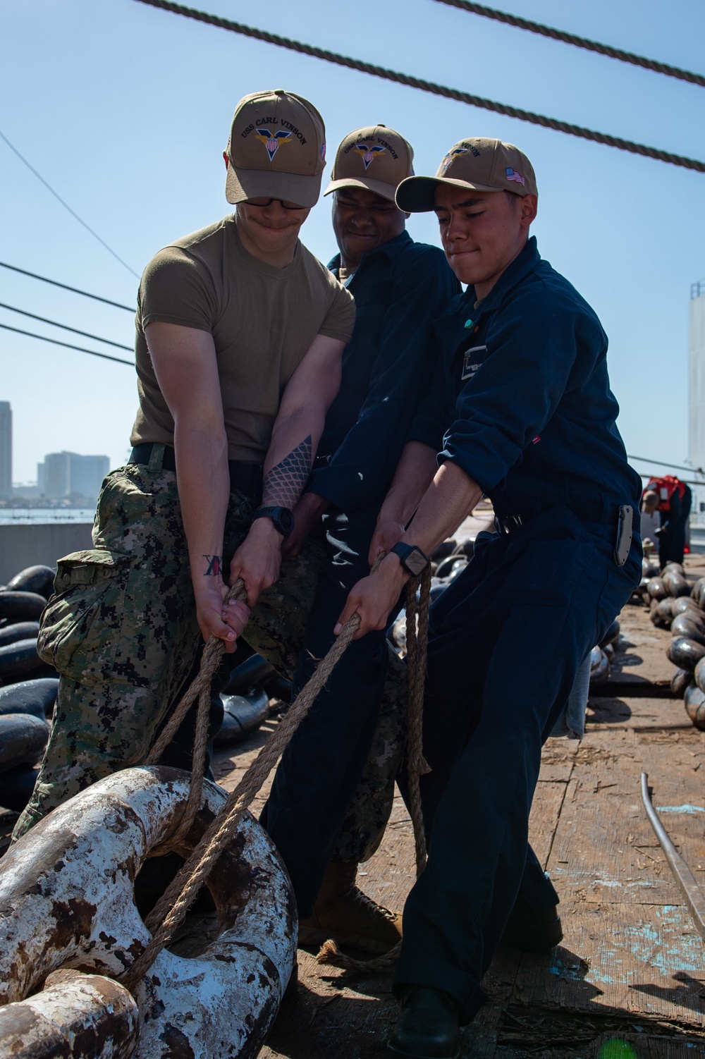 USS Carl Vinson (CVN 70) Sailors Move Anchor Chain