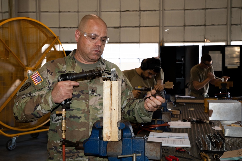 128th Aviation Brigade Soldiers Assemble Airframe Components!