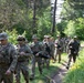 eFP Battle Group Poland Troops Train Together During Wet Gap Crossing Exercise