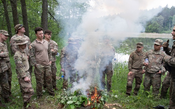 eFP Battle Group Poland Troops Train Together During Wet Gap Crossing Exercise