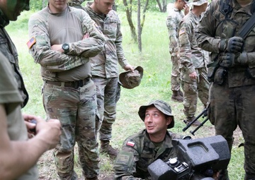 eFP Battle Group Poland Troops Train Together During Wet Gap Crossing Exercise