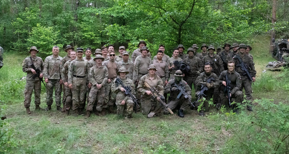 eFP Battle Group Poland Troops Train Together During Wet Gap Crossing Exercise