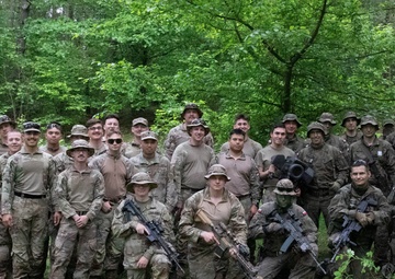 eFP Battle Group Poland Troops Train Together During Wet Gap Crossing Exercise