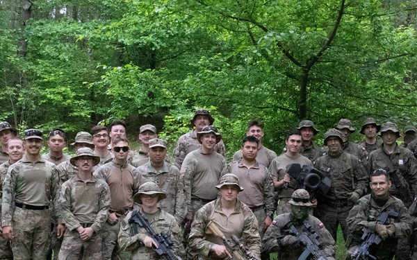 eFP Battle Group Poland Troops Train Together During Wet Gap Crossing Exercise