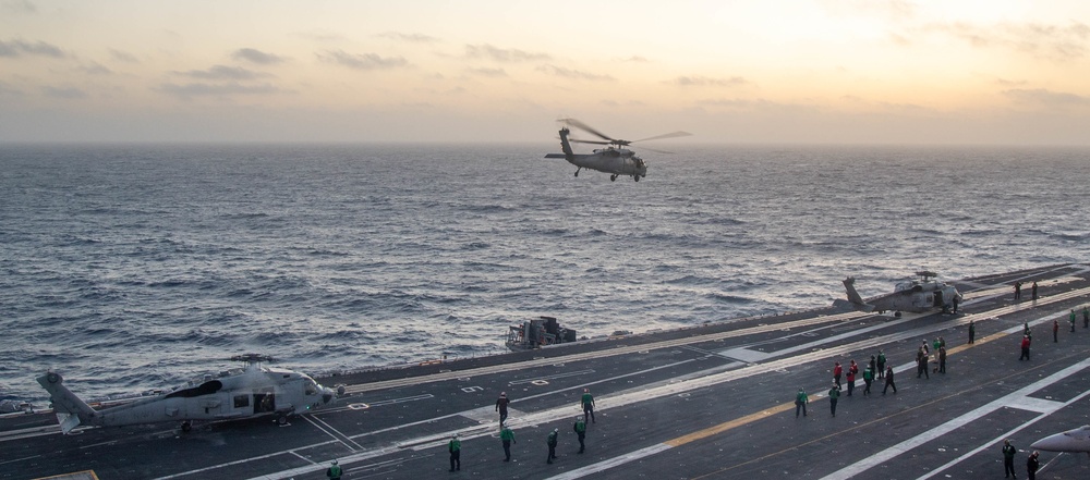 An MH-60S Sea Hawk Lifts Off Of The Flight Deck