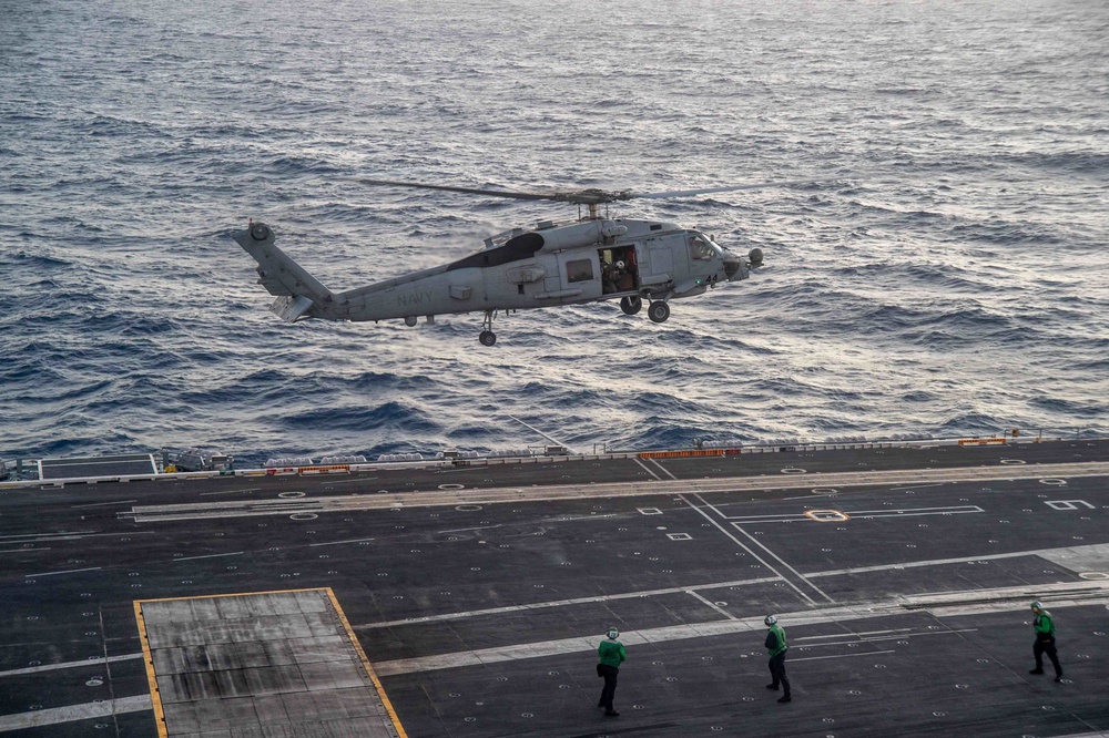 An MH-60R Sea Hawk Lifts Off Of The Flight Deck