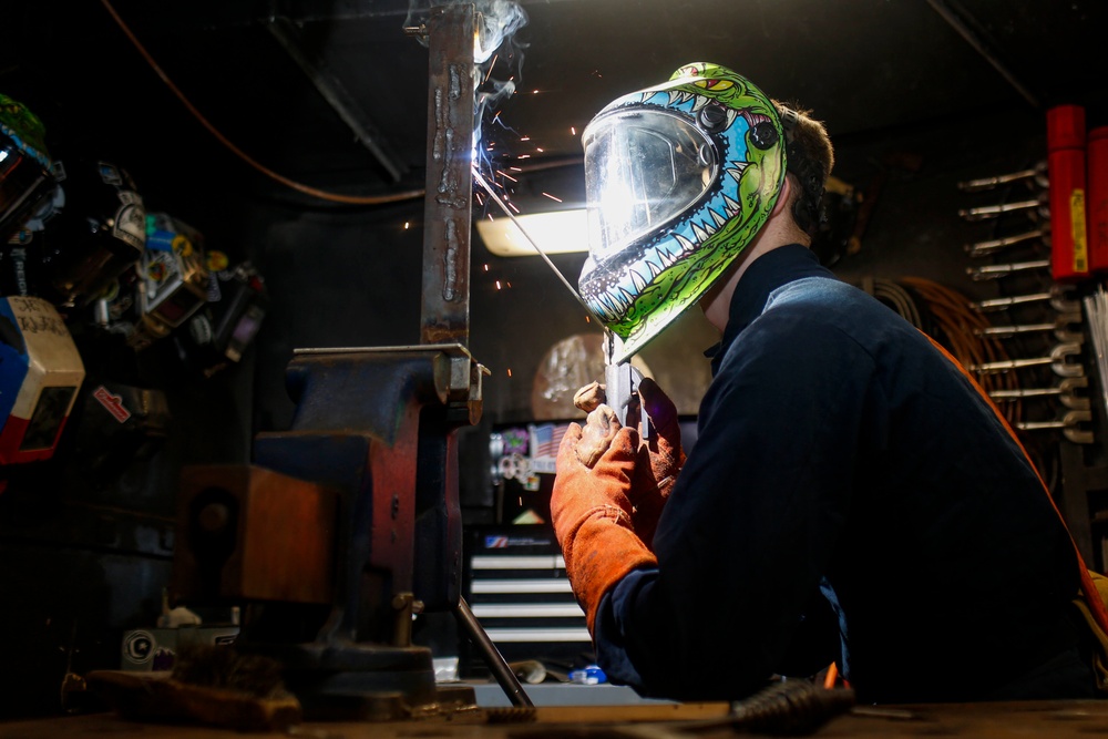 Abraham Lincoln Sailor welds