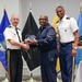 Lieutenant General Ronald J. Place and Command Sgt. Maj. Michael L. Gragg presenting an award with Colonel Patrick Kennedy.