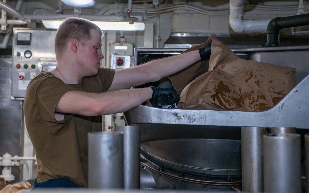 USS Ronald Reagan (CVN-76) Sailors manage mid-waste plant