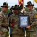 Maj. Timothy Peters receives 'Heart' trophy during Volunteer of the Year Ceremony