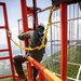 Don't Look Down: Air Traffic Control communication technician Marines maintain radio tower