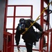 Don't Look Down: Air Traffic Control communication technician Marines maintain radio tower