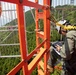 Don't Look Down: Air Traffic Control communication technician Marines maintain radio tower