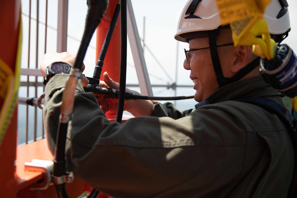 Don't Look Down: Air Traffic Control communication technician Marines maintain radio tower