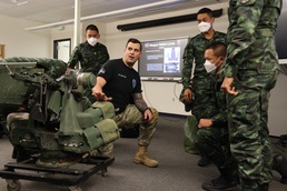 Guard members and Royal Thai Army members take part in Stryker Leaders Course SMEE