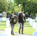 LTC Colestock &amp; CSM Rogers carry the Memorial Wreath to be displayed on the stand at the head of the center flagpole