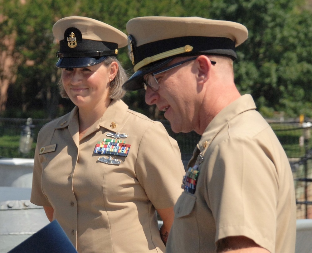 Husband and Wife re-enlist aboard the Battleship Wisconsin