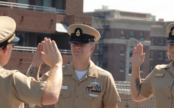 Husband and Wife re-enlist aboard the Battleship Wisconsin