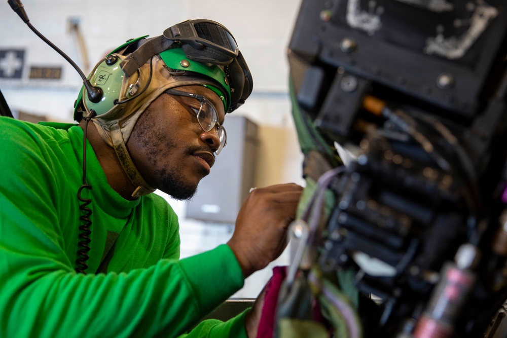 USS George H.W. Bush (CVN 77) Sailor Performs Maintenance