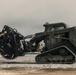 U.S. Marines work with Airmen and Navy Seebees during a joint airfield damage repair exercise